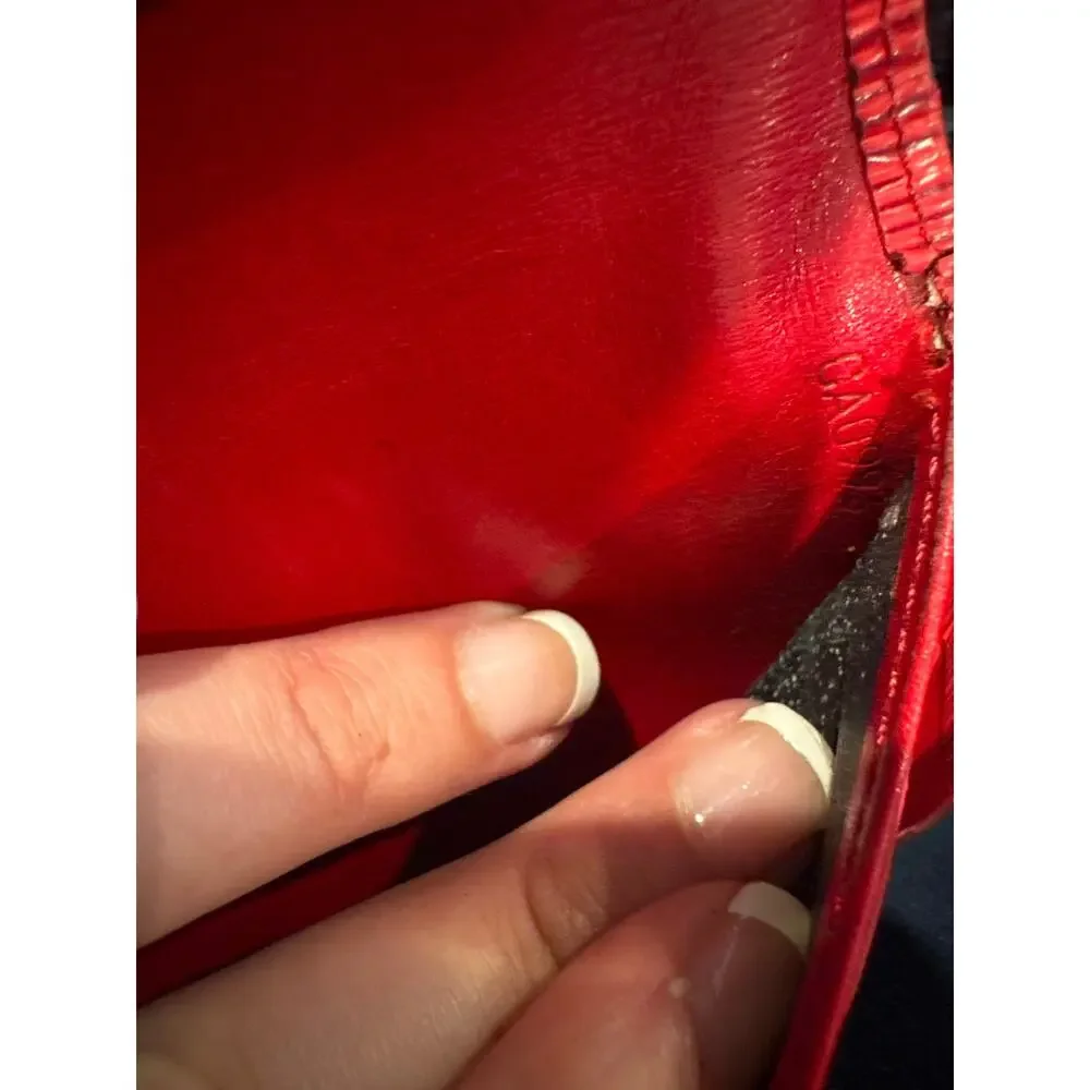 Louis Vuitton Epi International Wallet in Castilian Red